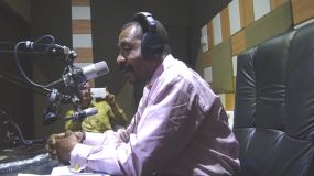 CEO of PEF speaks on a radio station in Ejura.jpg